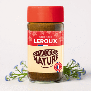 chicorée leroux 100g pot en verre. décor avec des fleurs de chicorée